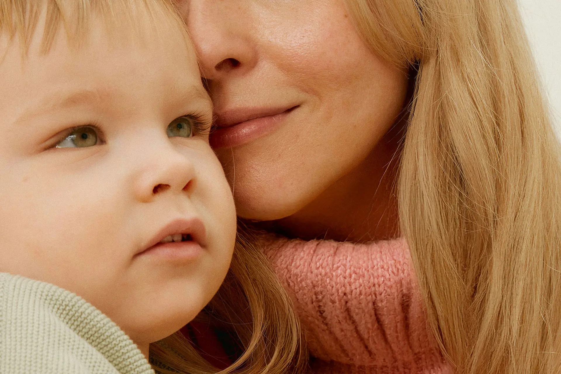 Woman holding a toddler